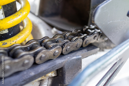 Принти на полотні Motorcycle drive chain on metal sprocket in mechanical close up