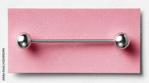 Silver barbell body modification jewelry close up