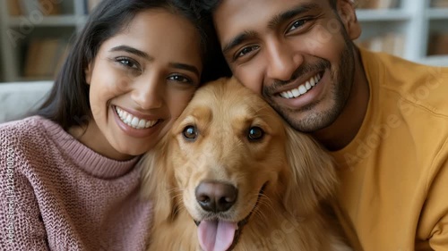 Happy couple posing with golden retriever dog at home for family pet portrait and social media banner
