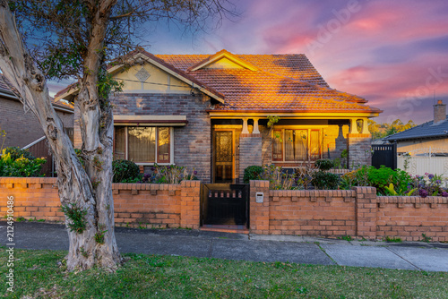 Suburban residential Brick house terracotta roof at sunset in Sydney  NSW Australia 