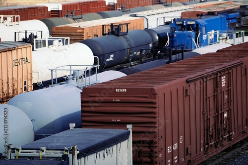 Konstfotografi Freight Train Cars and Tankers Parked in Rail Yard