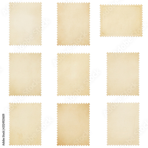 Set of blank vintage postage stamps with aged paper texture and perforated edges
