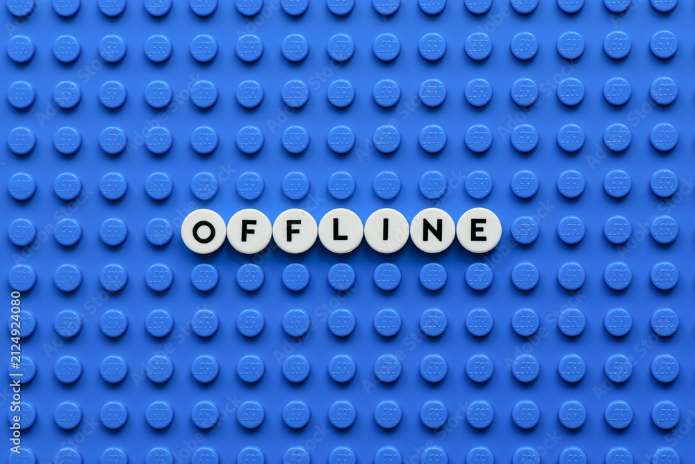 Fototapeta premium Tambov, Russian Federation - August 03, 2026 The word Offline on a blue Lego baseplate. The scene is made out of Lego dots.