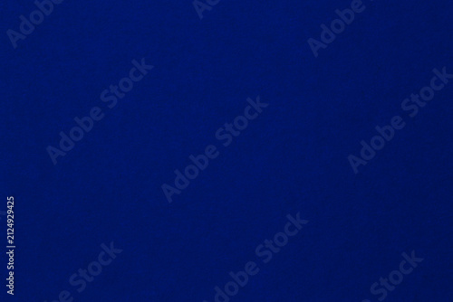 royal blue backdrop: close up of flat paper with velvety texture