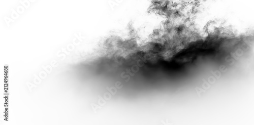 Fotografie Black smoke on a transparent background rising in a swirling motion during a day