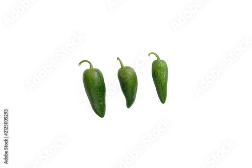 Photography Three, green, jalapeno chili peppers on a white background.