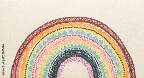 Colorful Hand-Drawn Rainbow Design with Intricate Patterns on Beige Background