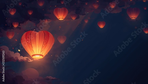 Colorful Heart-Shaped Lanterns Floating in the Night Sky Among Clouds