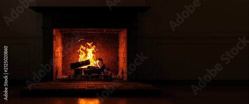 Cozy Fireplace with Flickering Flames in a Dark Room