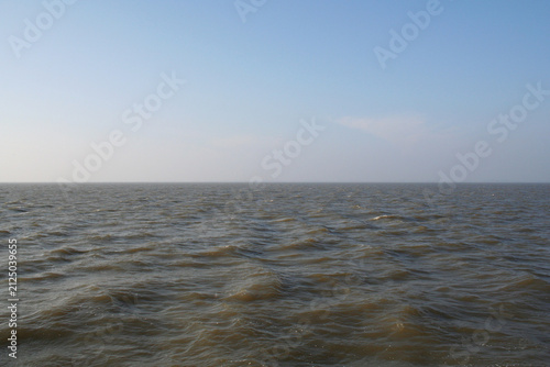 Foto Die Nordsee bis zum Horizont: Das Meer, ruhiges Wasser, wenige Wellen
