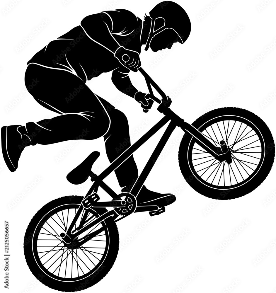 Fototapeta premium Black silhouette of a BMX rider performing a mid air trick