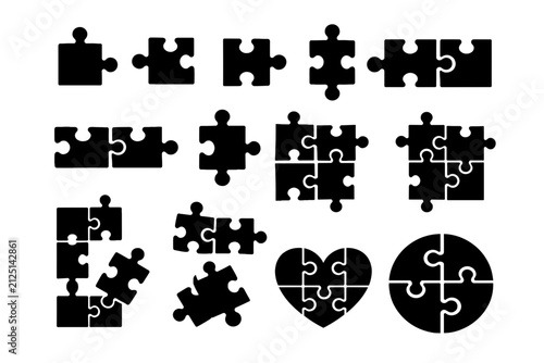 Black Puzzle Pieces in Various Shapes and Arrangements on White Background