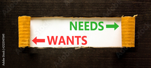 Obraz na plátně Needs instead wants words symbol