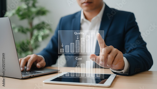 Business executive analyzing quality and cost metrics on digital screen