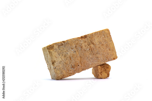 Traditional bricks on a white background for wall construction.