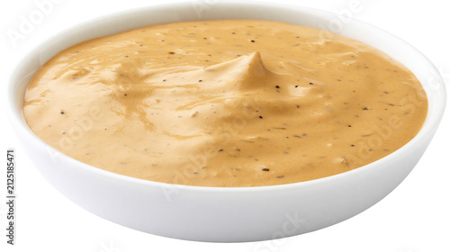 Foto Creamy orange dipping sauce with visible spices, isolated on transparent backgro