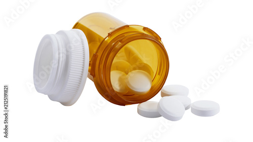 Принти на полотні Amber plastic prescription bottle with white cap and white pills spilled out, is
