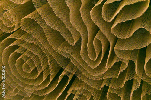 Abstract background, curves and spirals of mesh curtain, interior design element of office building