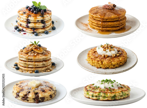Fotografie A varied collection of sweet and savory pancakes and crepes with fruits, syrups, creams, and seasonal toppings