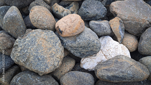 Fotografía Natural River Stone Texture Background with Mixed Rounded Boulders and Rocky Sur