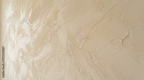 Wall Texture of Handcrafted Roman Clay with Plaster-Like Relief, Warm Beige Tones and Subtle Trowel Marks Background