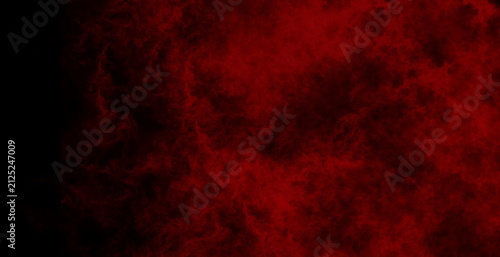Dark and gloomy abstract storm sky background with heavy black clouds and soft red atmospheric mist for expressive creative illustrations
