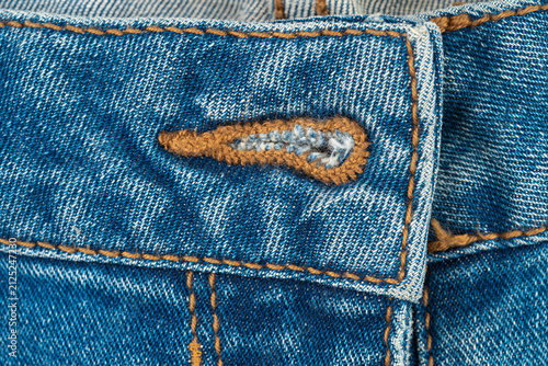 Картината върху платно Close-up of denim fabric with buttonhole