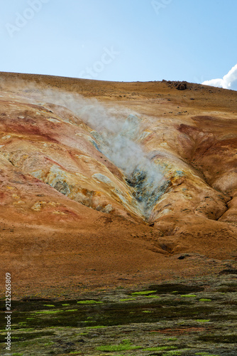 Obraz na plátně Geothermal Steam Rising from Colorful Icelandic Volcanic Hill