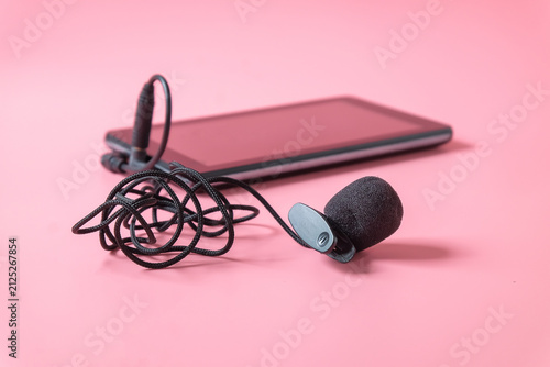 A microphone with long wire clip on smartphone .Sound record.