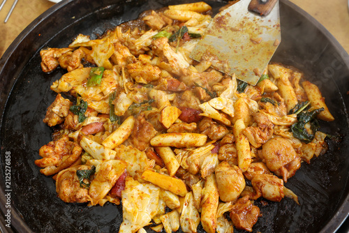 Spicy Korean Chicken Stir Fry Dakgalbi with Vegetables on Iron Pan