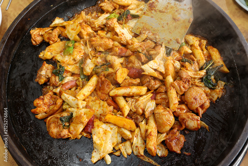 Spicy Korean Chicken Stir Fry Dakgalbi with Vegetables on Iron Pan