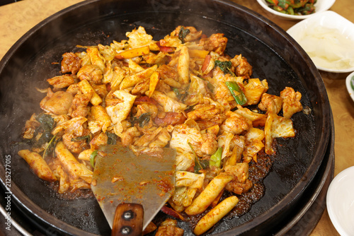 Spicy Korean Chicken Stir Fry Dakgalbi with Vegetables on Iron Pan