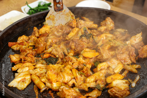 Spicy Korean Chicken Stir Fry Dakgalbi with Vegetables on Iron Pan