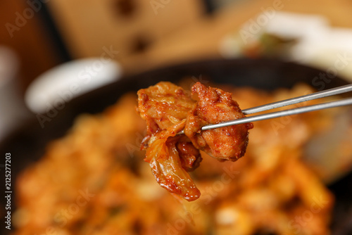 Spicy Korean Chicken Stir Fry Dakgalbi with Vegetables on Iron Pan