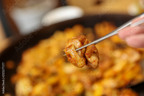 Spicy Korean Chicken Stir Fry Dakgalbi with Vegetables on Iron Pan