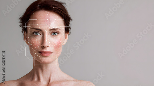 Young woman with facial skin analysis overlay highlighting complexion, texture and digital mapping, close up portrait conveying dermatology assessment and cosmetic technology