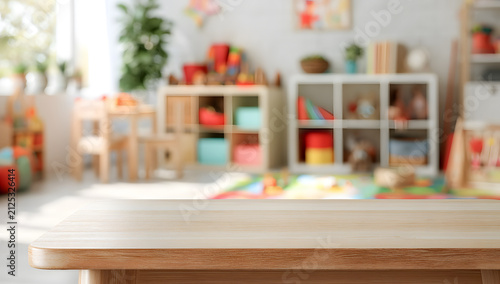 Blur the background of the playroom, focusing on the wooden table surface in the foreground