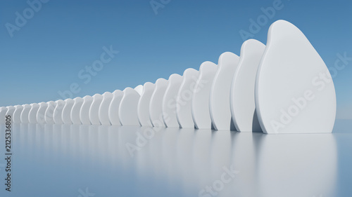 Fotografía Row of white abstract organic shapes receding into the distance on a reflective