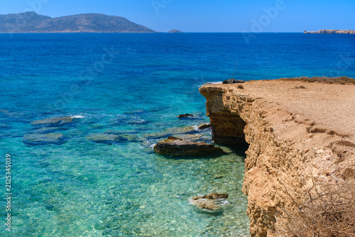 Rocky coastline with Aegean Sea, Koufonisi, Cyclades, Greece