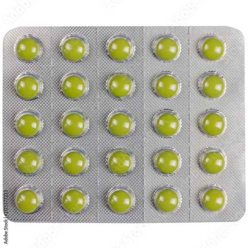 twenty-five round green tablets in a blister pack