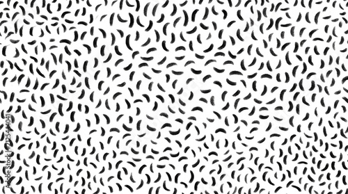 A playful and minimalist pattern of scattered black brush strokes on a clean white background.