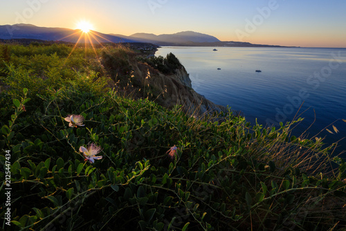 Beautiful sunrise on the Greek island of Kefalonia with a panorama view of Xi beach