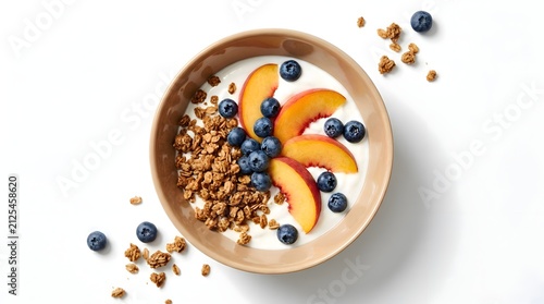 Healthy yogurt bowl with peaches, blueberries and granola