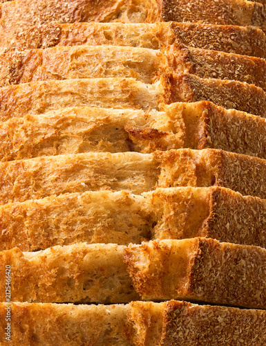 close up of wheat bread with sourdough , food textured. Background of wheat bread with sourdough. wheat bread close up.
