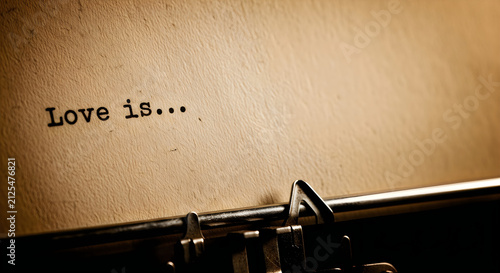 Memorial day remembrance vintage typewriter with 'love is ' message honoring sacrifice