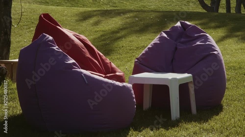 Upholstered seats located in the park recreation area