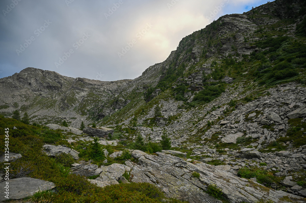 Obraz premium : Rocky Alpine Scree Slope and Scree Ridge Under Overcast Sky