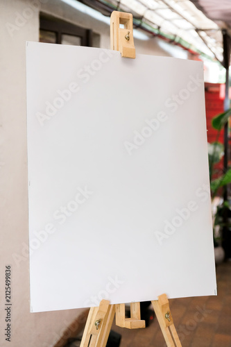 Foto Blank wedding welcome sign mockup on wooden easel inside elegant reception venue