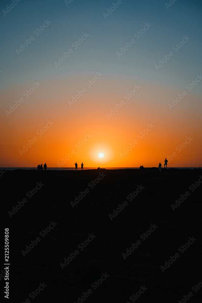 Naklejka premium Silhouettes at Sunset in La Guajira Desert