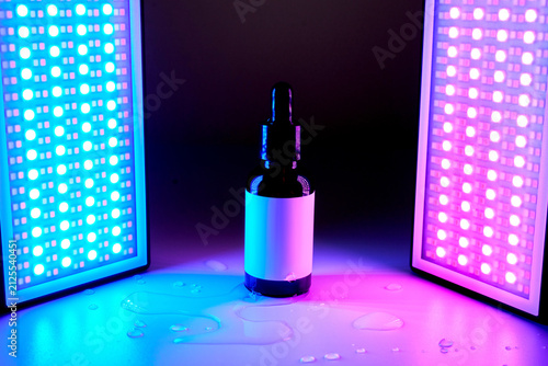 Serum dropper bottle with led light therapy effects